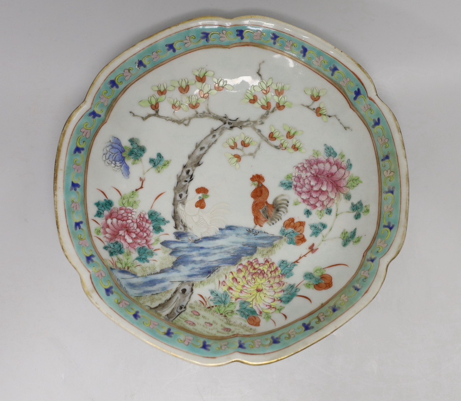 A set of Chinese famille rose bird or insect and flowers dishes, Tongzhi mark and period (1862-74), largest 23 cm wide